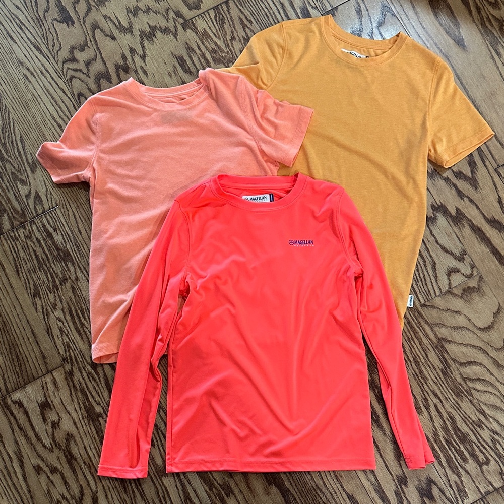 Three Magellan outdoor shirts. Boys size medium
